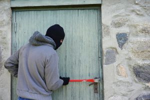 burglar breaking into business premises