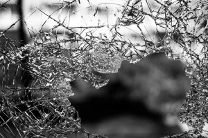 Vandal breaks windown at business premises